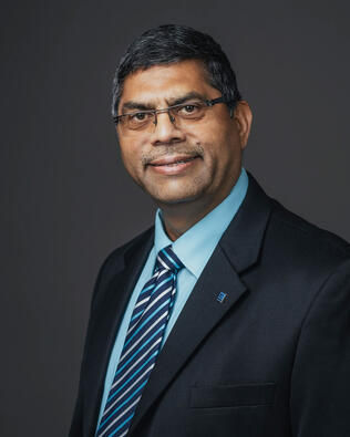 Headshot of Raju Shah