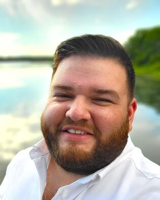 Headshot of Alex James