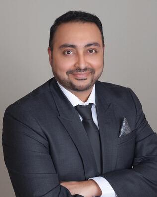 Headshot of MK Hamid
