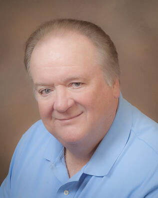 Headshot of Kevin Corson