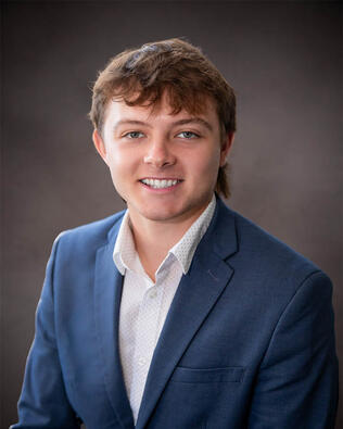 Headshot of Ozzy Manito