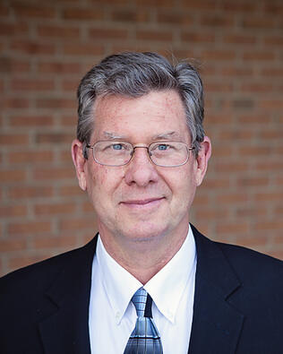 Headshot of Tom Harte