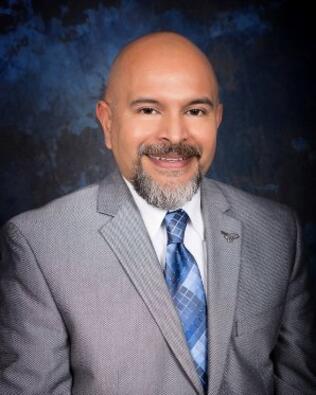 Headshot of Alfred Espinor Jr