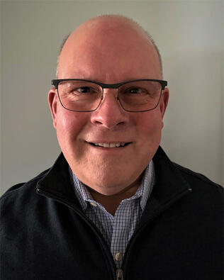 Headshot of Darrell Guitar