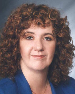 Headshot of J Maxine Shields