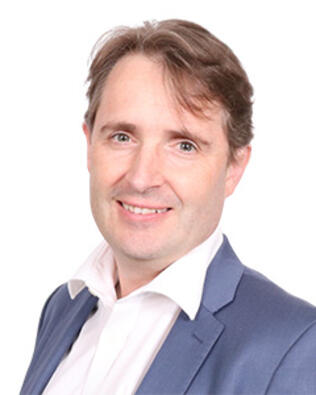 Headshot of Owen Tracy