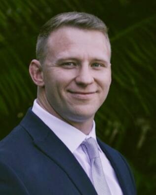 Headshot of Sean-Paul Baker