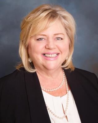 Headshot of Suzanne Naphy