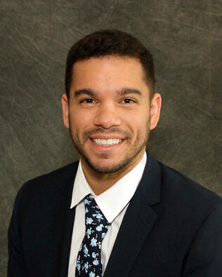 Headshot of Alex Alston