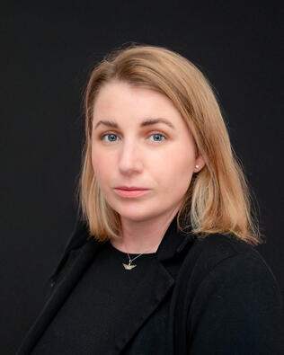 Headshot of Brenna Escarciga