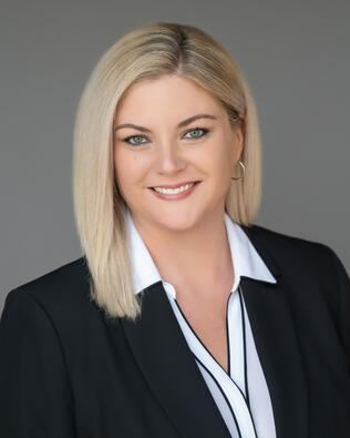 Headshot of Sarah K. Guffey