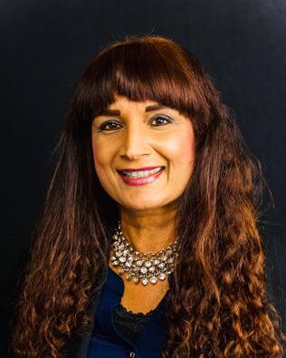 Headshot of Suman Hartzell