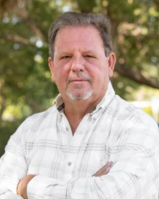 Headshot of David Grego