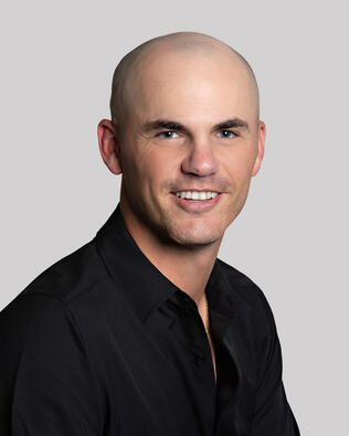 Headshot of Ben Tirlia