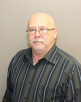 Headshot of Mark J Manning
