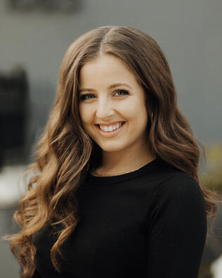 Headshot of Sabine West