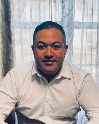 Headshot of Ray Aviles