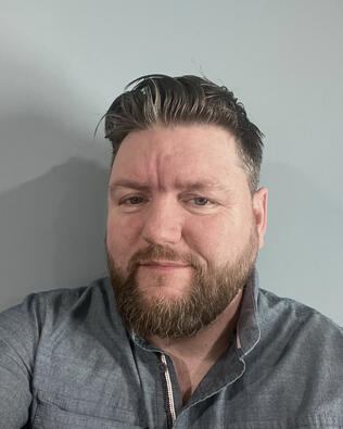 Headshot of David Cousins