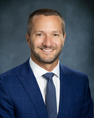 Headshot of Adam Oberski