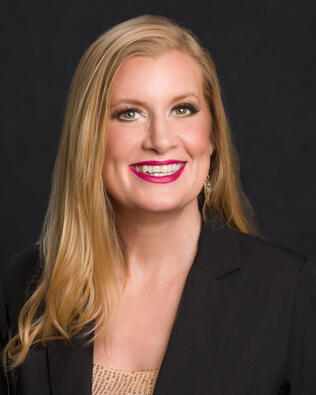 Headshot of Kristi Ferguson, Assoc. Broker