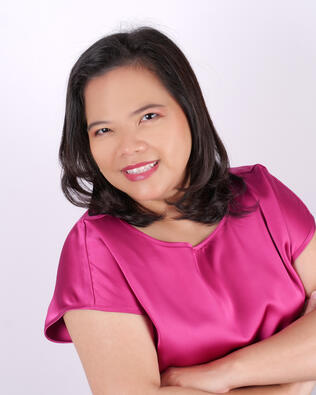 Headshot of Karisma De Asis