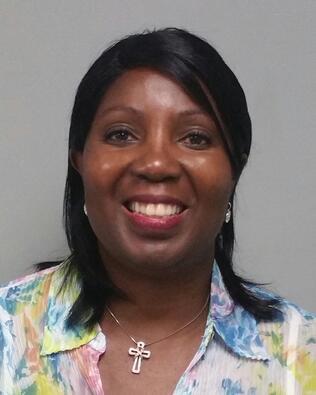 Headshot of Greta Beverly