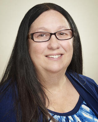 Headshot of Donna Hussain