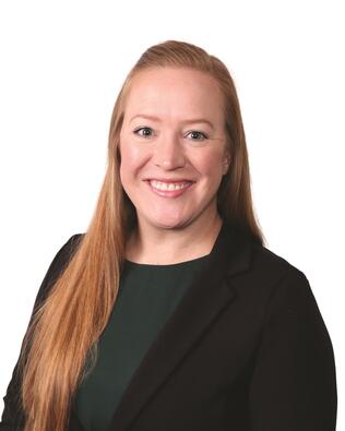 Headshot of Kelly Cooper