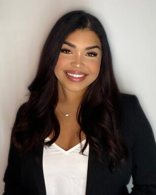 Headshot of KALI TANNER