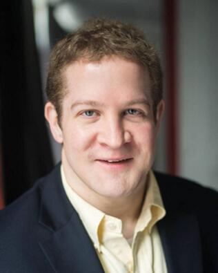 Headshot of Nick Hogan