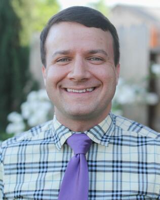 Headshot of Adam Brown