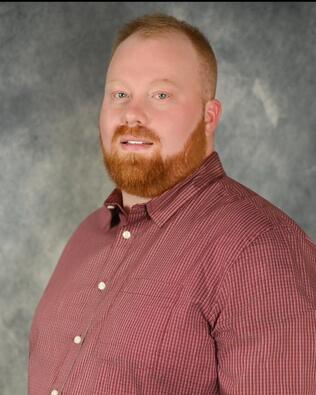 Headshot of Daniel Hughes