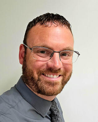 Headshot of Adam Bower