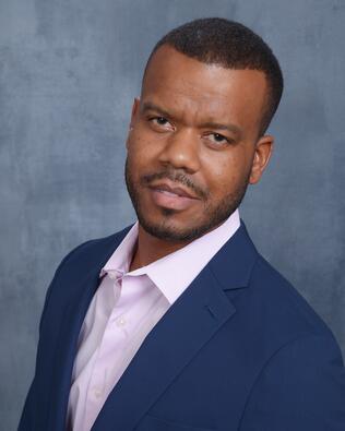 Headshot of Warren Newman