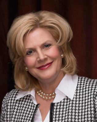 Headshot of Paula Kirby