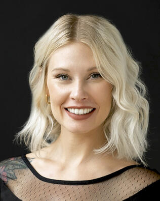 Headshot of Carly Collins
