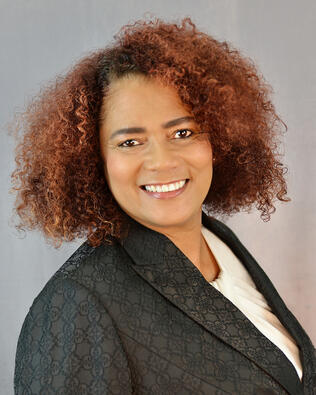 Headshot of Kelly Sullivan