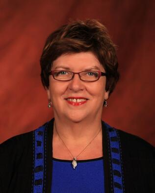 Headshot of Jo Anne Amoura