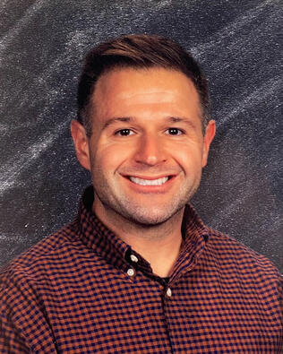 Headshot of Nick Huebner