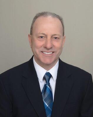 Headshot of Clive Meaden