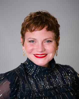 Headshot of ERIN TULLOS