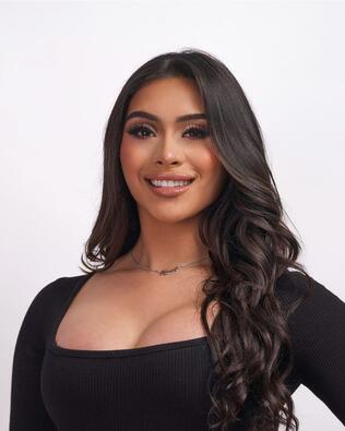 Headshot of Andrea Mercado
