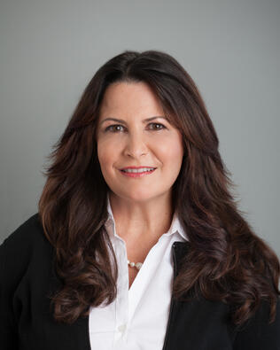 Headshot of Tracy-Leigh Mahan