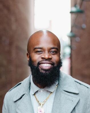 Headshot of Greg Hutton Jr