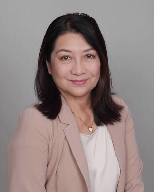 Headshot of Claire Assayag