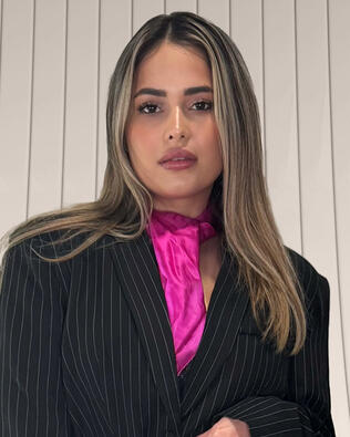 Headshot of Paola Arias