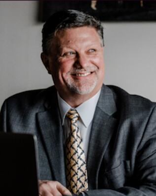 Headshot of Eric Winklhofer