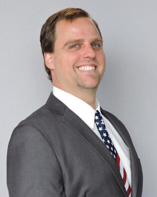 Headshot of Erik Bremer