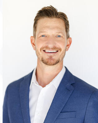 Headshot of Ben Karlin
