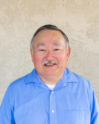 Headshot of Wallace Sasaki